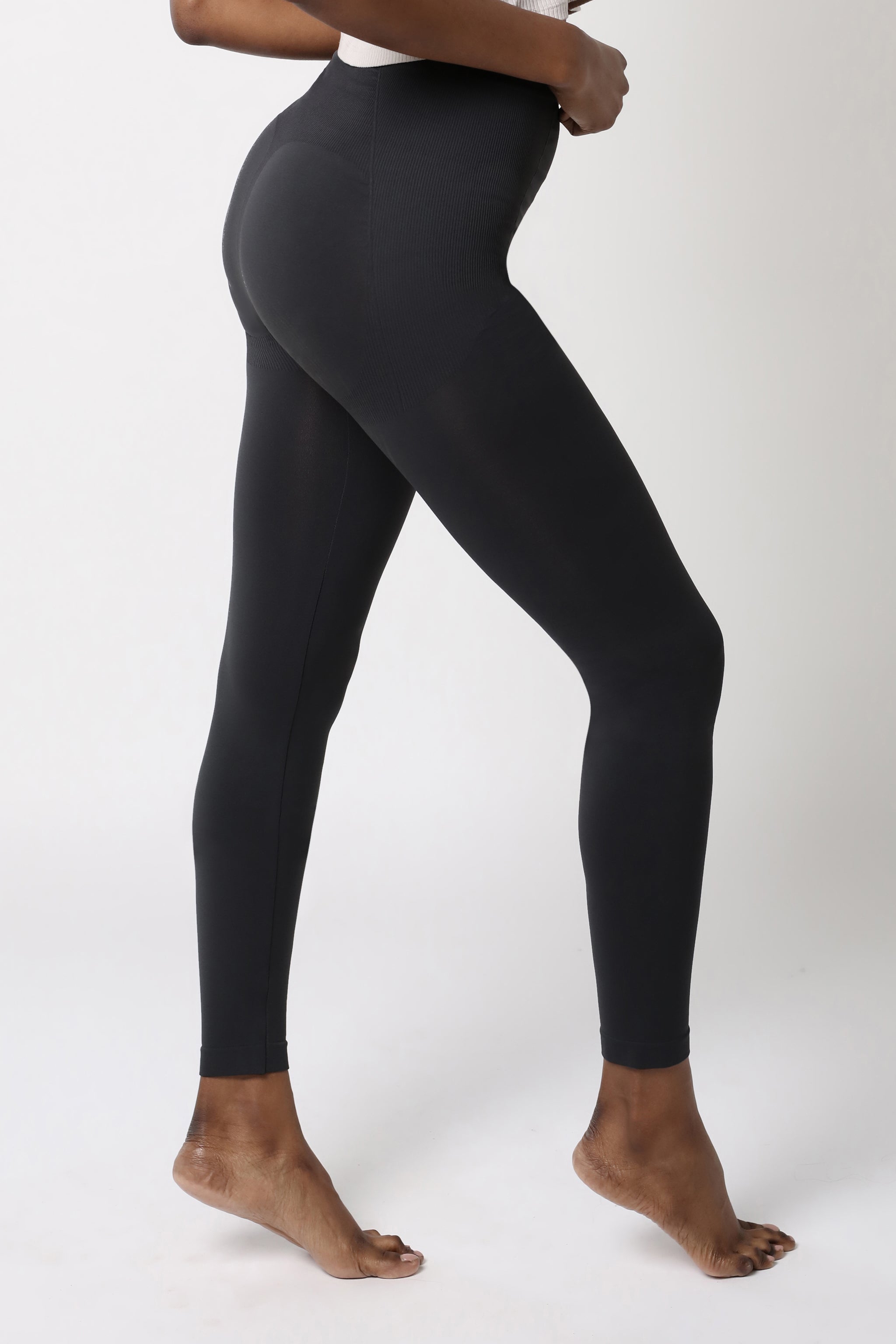 side view of black legging - Black